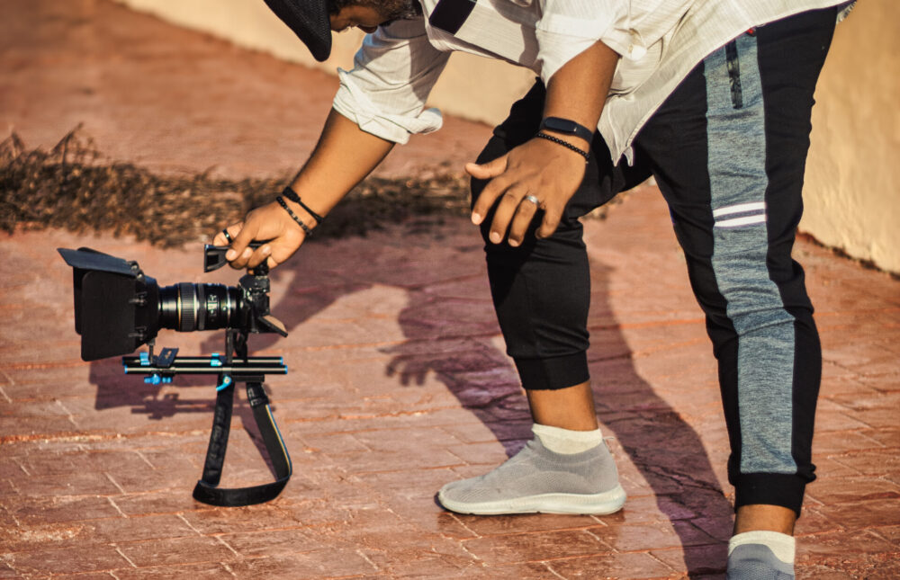 filmmaker-touring-city-with-his-camera-taking-images-his-film-project